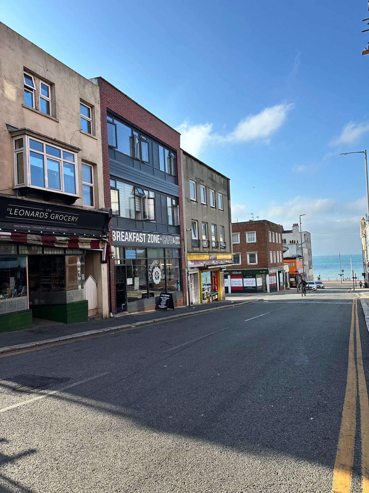 Breakfast Zone Cafe on London Road with the sea in the background, St Leonards-on-Sea